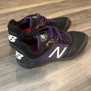 New Balance Fresh Foam 3000 Men’s Black Cleats with Purple Accents